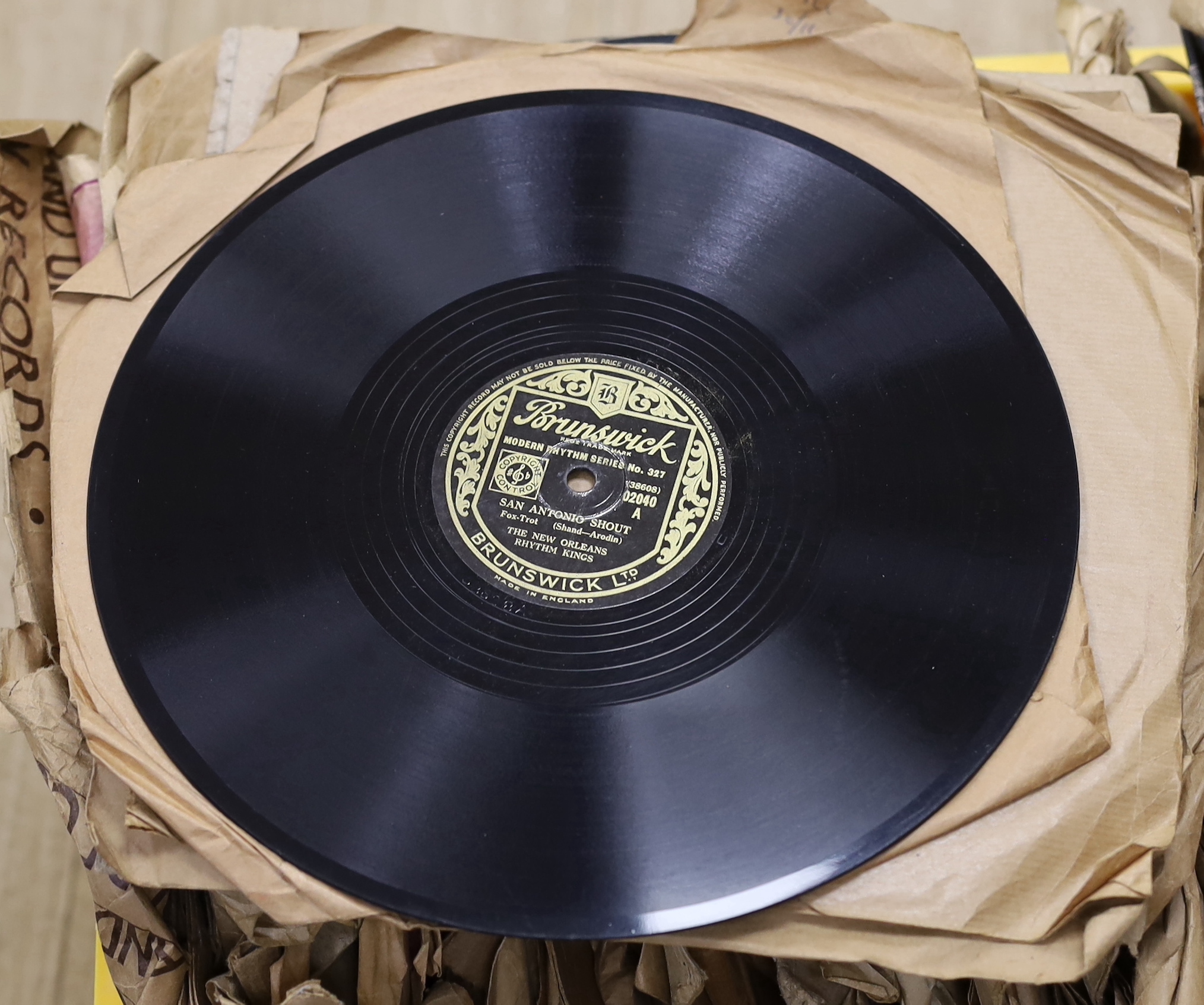 A collection of gramophone 78s, including jazz recordings, big band, and classical music, performers include Duke Ellington, Fats Waller, Louis Armstrong, Bessie Smith, the History of Jazz set, Bunk Johnson, Bix, Beiderb